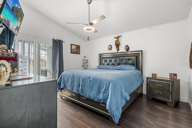 bedroom with baseboards, a ceiling fan, dark wood finished floors, and vaulted ceiling