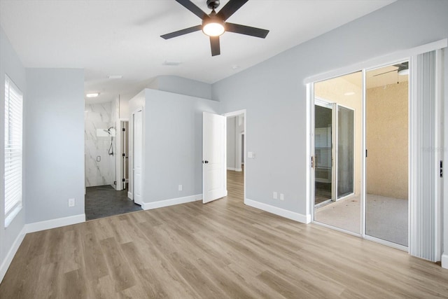 unfurnished bedroom featuring baseboards, ceiling fan, and wood finished floors