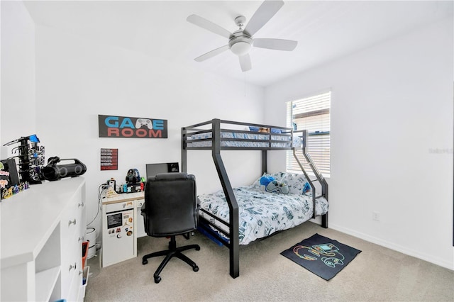 bedroom with baseboards, ceiling fan, and light carpet