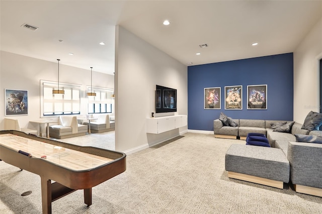 living room featuring carpet flooring, recessed lighting, baseboards, and visible vents