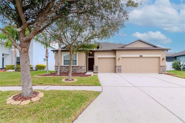 ranch-style home with stone siding, stucco siding, an attached garage, driveway, and a front lawn