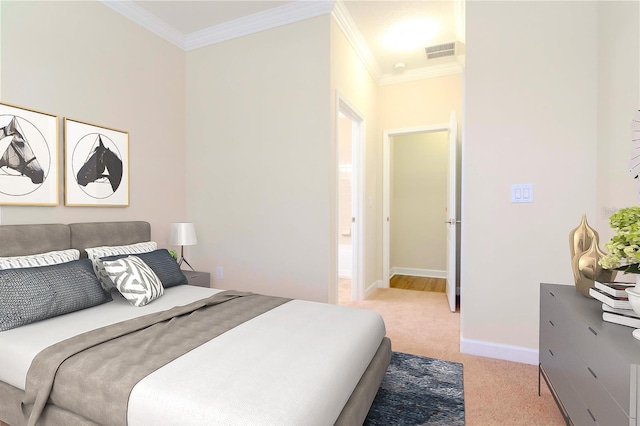bedroom with light colored carpet, ornamental molding, and baseboards