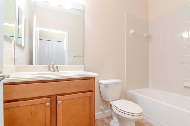 bathroom featuring toilet, vanity, tile patterned floors, shower / tub combination, and baseboards