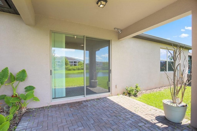 9309 Tradewater Oaks Ct, Riverview, FL 33578 - view of patio featuring a water view