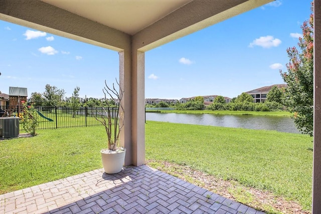 9309 Tradewater Oaks Ct, Riverview, FL 33578 - view of patio featuring a water view, central air condition unit, and a playground