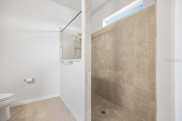 9309 Tradewater Oaks Ct, Riverview, FL 33578 - bathroom with toilet, walk in shower, tile patterned floors, and baseboards