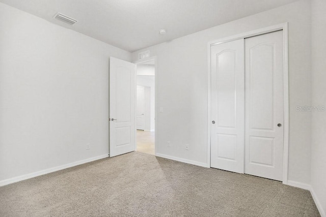 9309 Tradewater Oaks Ct, Riverview, FL 33578 - unfurnished bedroom featuring carpet floors, baseboards, and a closet