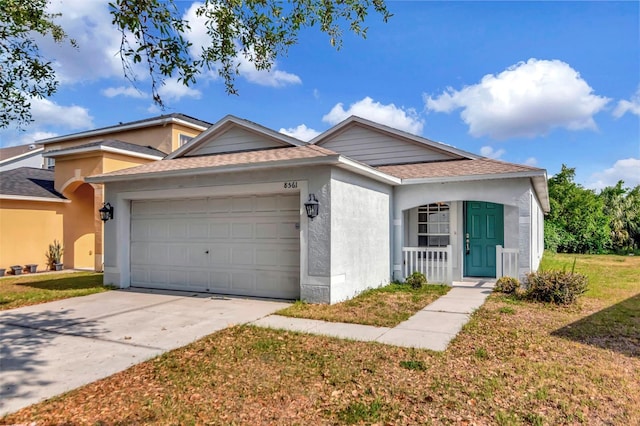 8561 Deer Chase Dr, Riverview, FL 33578 - ranch-style house featuring concrete driveway, a garage, stucco siding, and a front yard