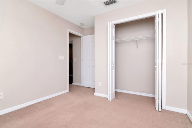 8561 Deer Chase Dr, Riverview, FL 33578 - unfurnished bedroom featuring carpet flooring, a closet, visible vents, and baseboards