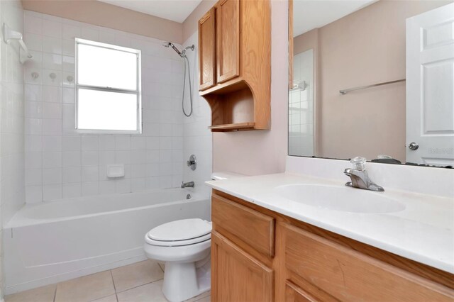 8561 Deer Chase Dr, Riverview, FL 33578 - bathroom featuring toilet, tile patterned floors, vanity, and shower / tub combination