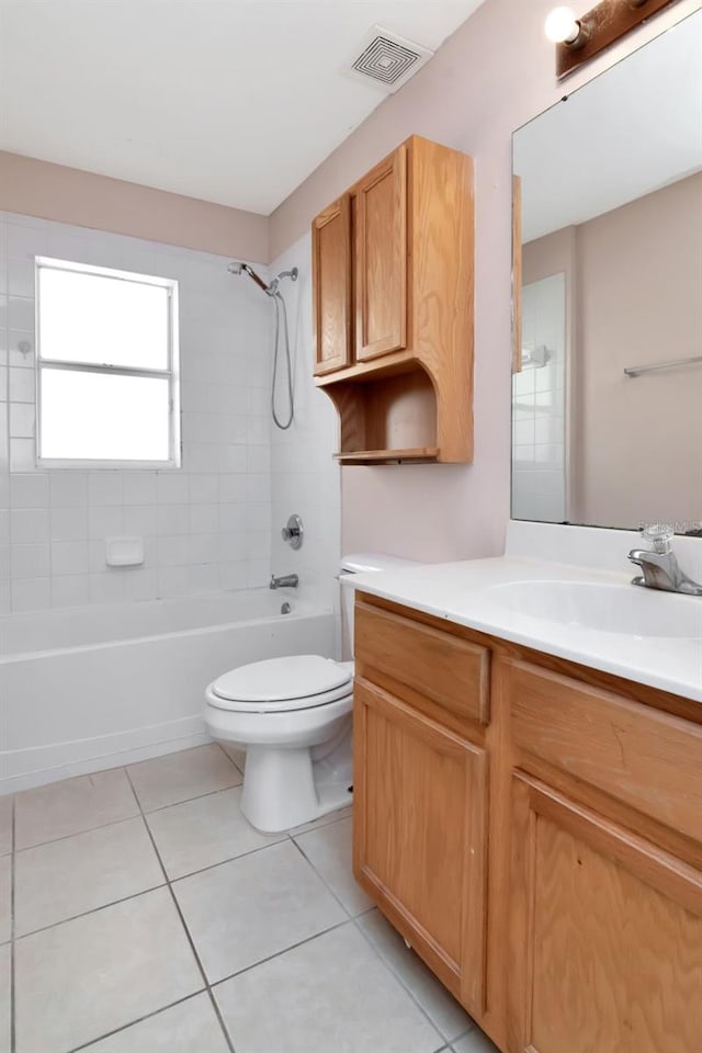 8561 Deer Chase Dr, Riverview, FL 33578 - bathroom with toilet, visible vents, tile patterned floors, vanity, and shower / washtub combination
