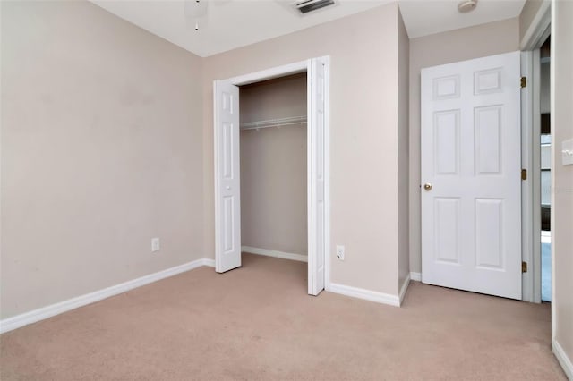 8561 Deer Chase Dr, Riverview, FL 33578 - unfurnished bedroom with light colored carpet, baseboards, a closet, and visible vents