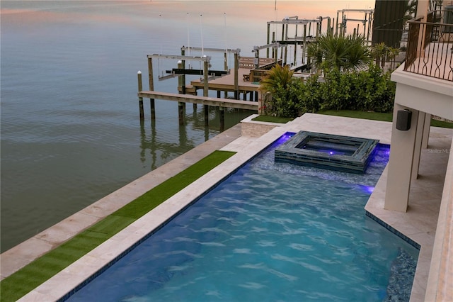 5939 Bayview Cir S, Gulfport, FL 33707 - pool at dusk with boat lift, a boat dock, an outdoor pool, a water view, and an in ground hot tub