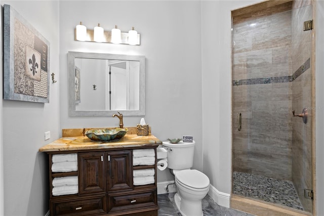 5939 Bayview Cir S, Gulfport, FL 33707 - full bath with baseboards, vanity, toilet, and a shower stall
