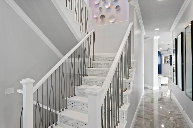5939 Bayview Cir S, Gulfport, FL 33707 - staircase featuring crown molding, recessed lighting, marble finish floor, and baseboards