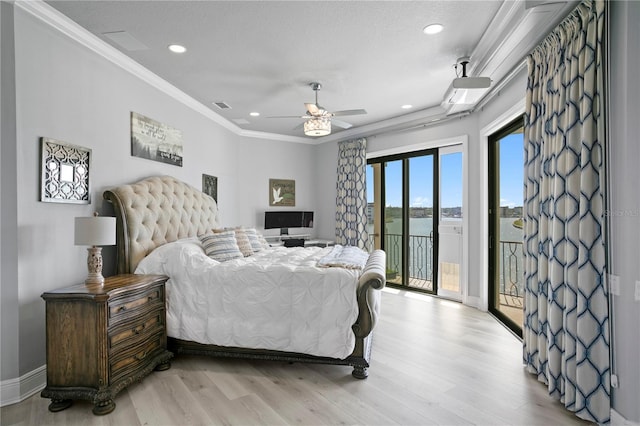 5939 Bayview Cir S, Gulfport, FL 33707 - bedroom with light wood-type flooring, recessed lighting, ornamental molding, and access to exterior