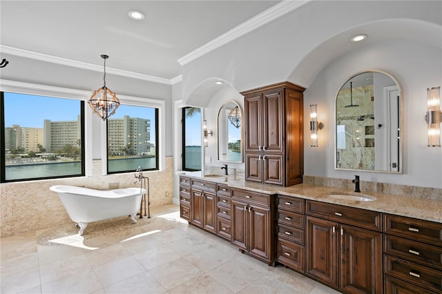 5939 Bayview Cir S, Gulfport, FL 33707 - bathroom with a sink, a shower, a soaking tub, and double vanity
