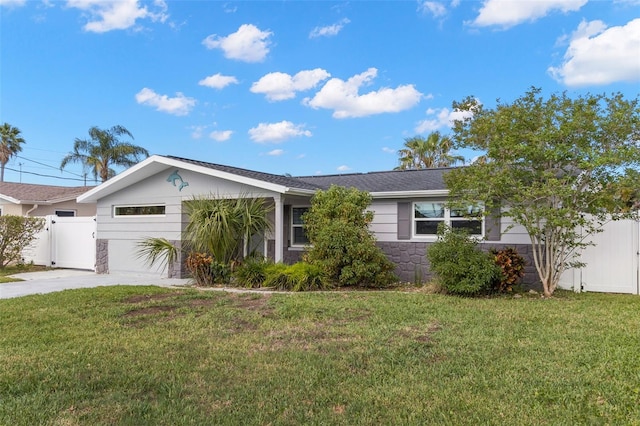 13704 Evelane Dr, Hudson, FL 34667 - ranch-style house with driveway and stone siding