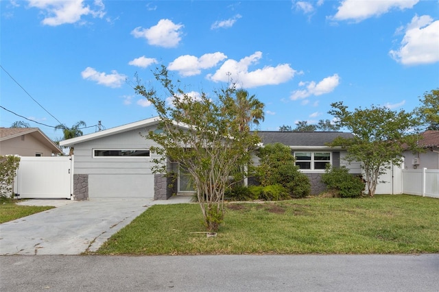 13704 Evelane Dr, Hudson, FL 34667 - view of front facade with stone siding and concrete driveway