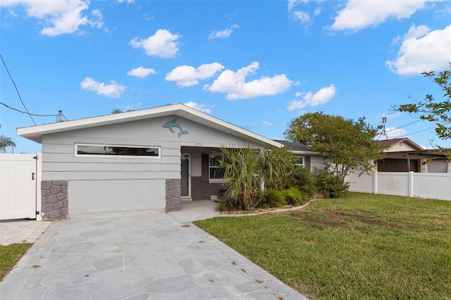 13704 Evelane Dr, Hudson, FL 34667 - single story home with stone siding
