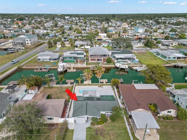 13704 Evelane Dr, Hudson, FL 34667 - aerial perspective of suburban area featuring a large body of water