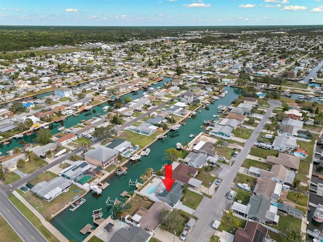 13704 Evelane Dr, Hudson, FL 34667 - aerial view of property's location featuring nearby suburban area and a large body of water