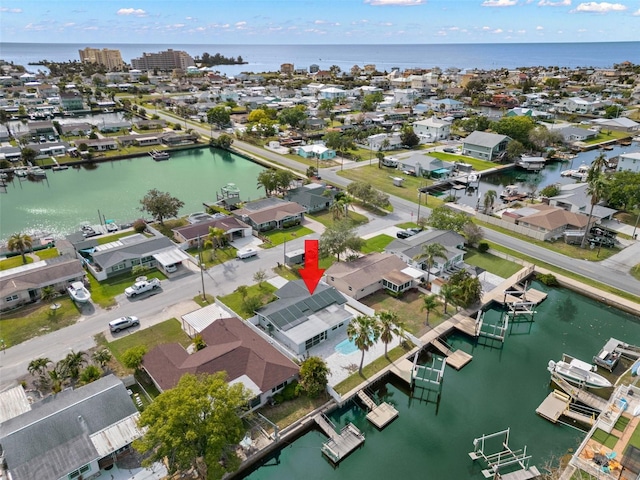 13704 Evelane Dr, Hudson, FL 34667 - aerial view of residential area with a nearby body of water