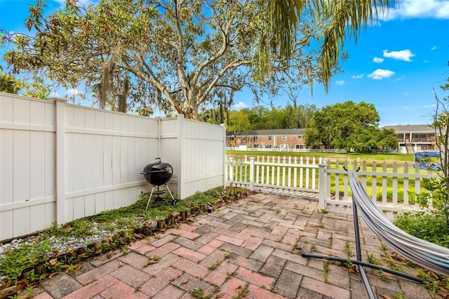 view of patio / terrace with fence