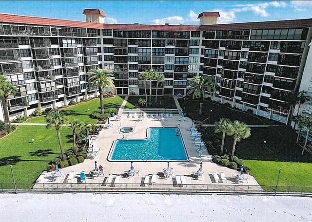 18304 Gulf Blvd Unit 309, Redington Shores, FL 33708 - community pool with a patio