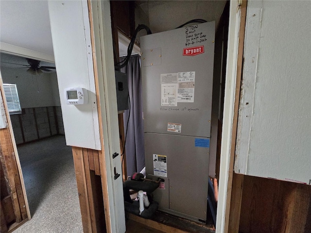 utility room featuring heating unit
