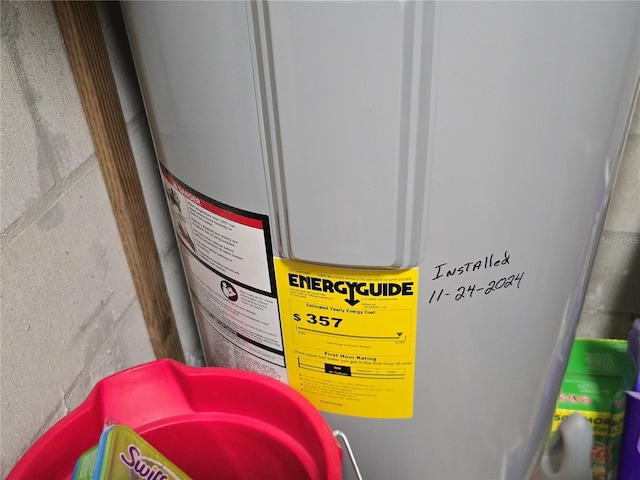interior details with concrete block wall and electric water heater