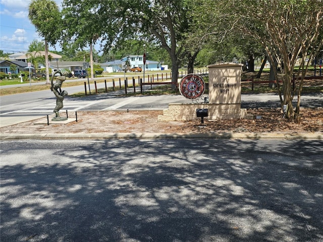 view of street with curbs
