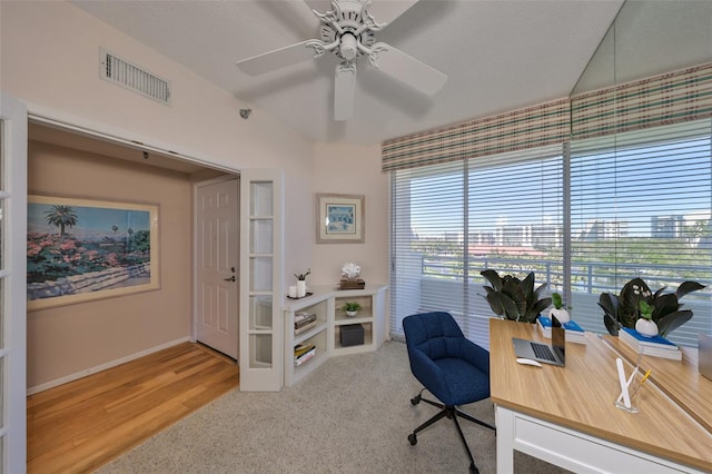 7882 Sailboat Key Blvd S Unit 401, South Pasadena, FL 33707 - office area with ceiling fan, baseboards, wood finished floors, lofted ceiling, and visible vents
