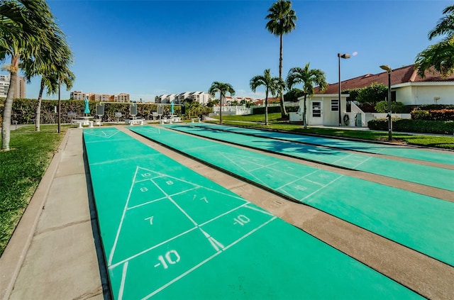 7882 Sailboat Key Blvd S Unit 401, South Pasadena, FL 33707 - view of property's community with a yard and shuffleboard