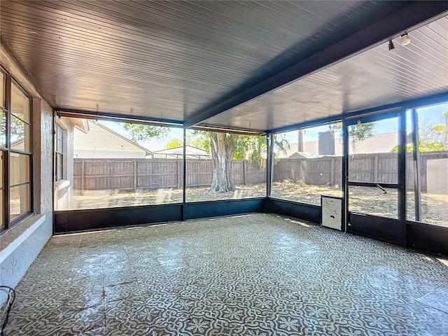 1005 Cameo Crest Ln, Valrico, FL 33596 - unfurnished sunroom featuring healthy amount of natural light and rail lighting