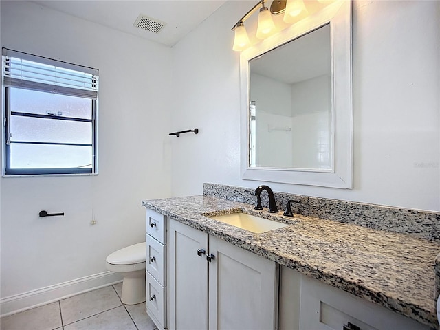 1005 Cameo Crest Ln, Valrico, FL 33596 - bathroom featuring tile patterned flooring, toilet, vanity, and baseboards