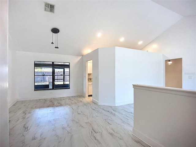 1005 Cameo Crest Ln, Valrico, FL 33596 - unfurnished room with lofted ceiling, light marble finish floors, baseboards, and recessed lighting