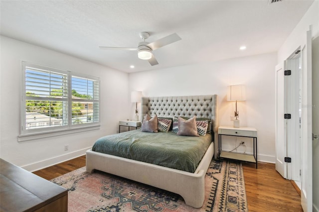 bedroom featuring recessed lighting, baseboards, a ceiling fan, and wood finished floors