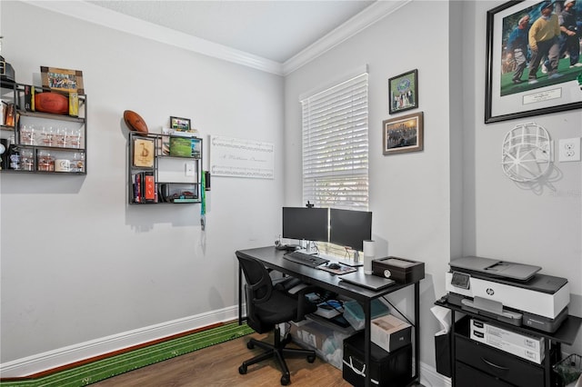 home office featuring baseboards, ornamental molding, and wood finished floors