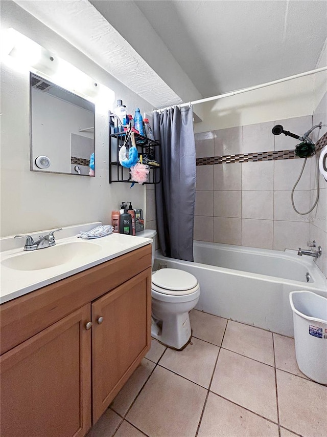 bathroom with toilet, shower / bathtub combination with curtain, tile patterned flooring, and vanity