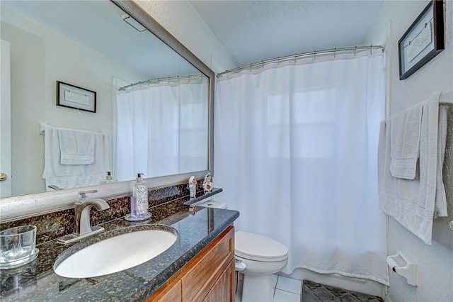 bathroom featuring vanity, toilet, tile patterned floors, and a shower with shower curtain