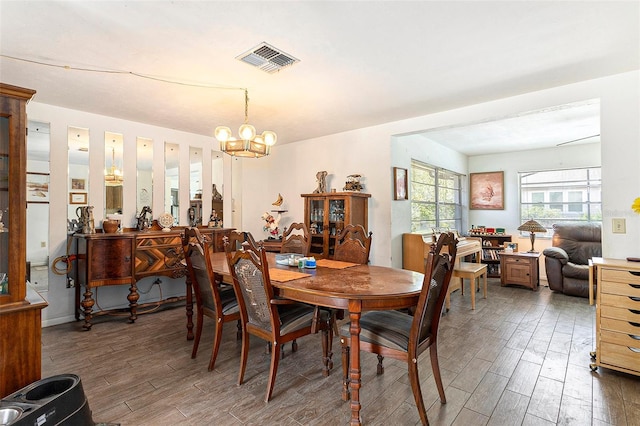 64 Sj Kellner Blvd, Beverly Hills, FL 34465 - dining area featuring wood finished floors and a chandelier