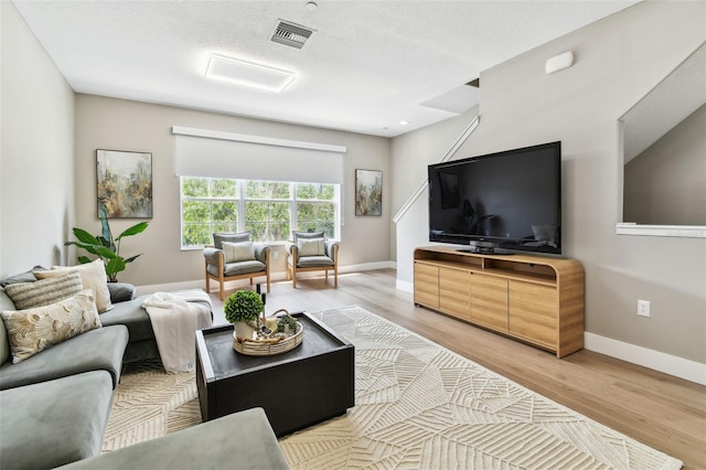 2547 Lexington Oak Dr, Brandon, FL 33511 - living area featuring light wood-style floors and baseboards