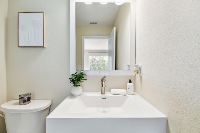 2547 Lexington Oak Dr, Brandon, FL 33511 - bathroom featuring toilet and vanity