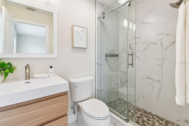 2547 Lexington Oak Dr, Brandon, FL 33511 - bathroom with toilet, a marble finish shower, and vanity