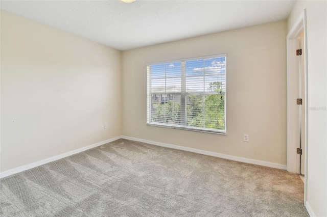2547 Lexington Oak Dr, Brandon, FL 33511 - unfurnished room featuring carpet and baseboards