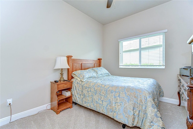 bedroom with baseboards, carpet flooring, and ceiling fan