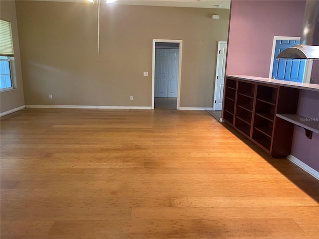 208 Shepard Ave, Dundee, FL 33838 - empty room featuring wood finished floors and baseboards