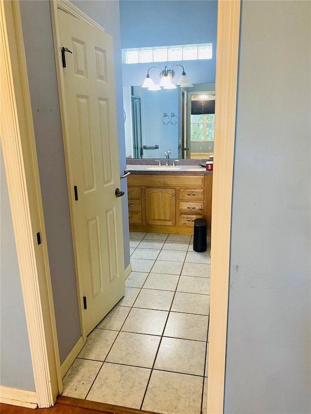 208 Shepard Ave, Dundee, FL 33838 - bathroom featuring tile patterned floors and vanity
