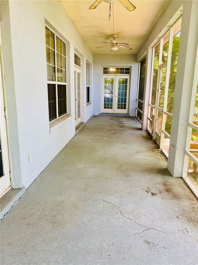 208 Shepard Ave, Dundee, FL 33838 - unfurnished sunroom featuring french doors, ceiling fan, and healthy amount of natural light